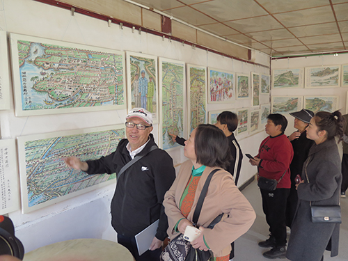 耄耋老翁用畫筆記錄故鄉.jpg 耄耋老翁用畫筆記錄故鄉.jpg